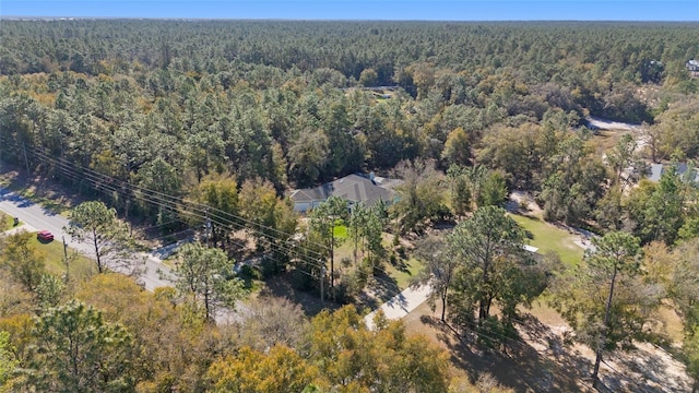 bird's eye view featuring a forest view