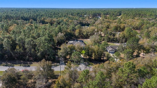 bird's eye view with a forest view