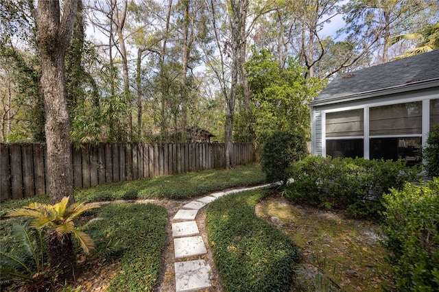 view of yard featuring fence