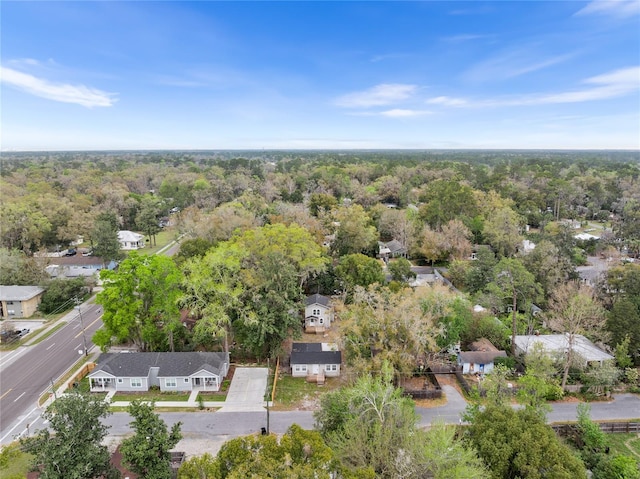 drone / aerial view with a view of trees