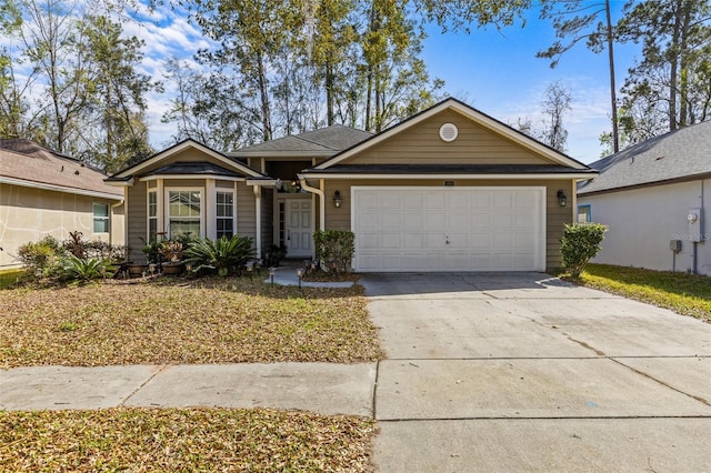 ranch-style home with a garage and concrete driveway