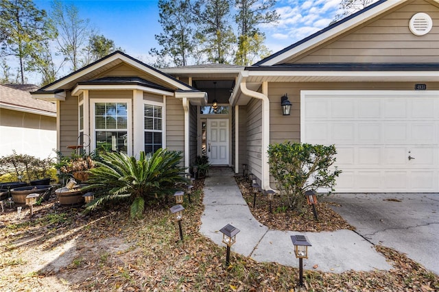 view of front of property with a garage