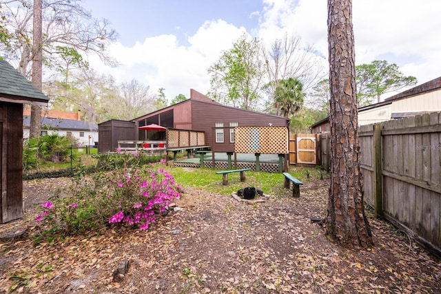 view of yard with a fenced backyard