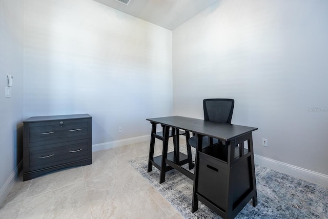 home office with baseboards