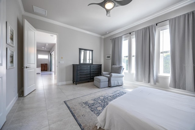 bedroom featuring light tile patterned floors, baseboards, ceiling fan, and crown molding