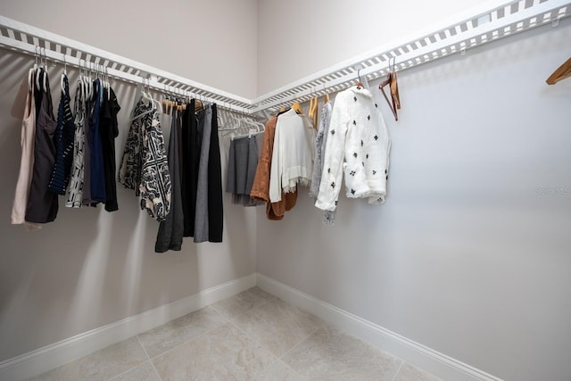 walk in closet featuring tile patterned floors