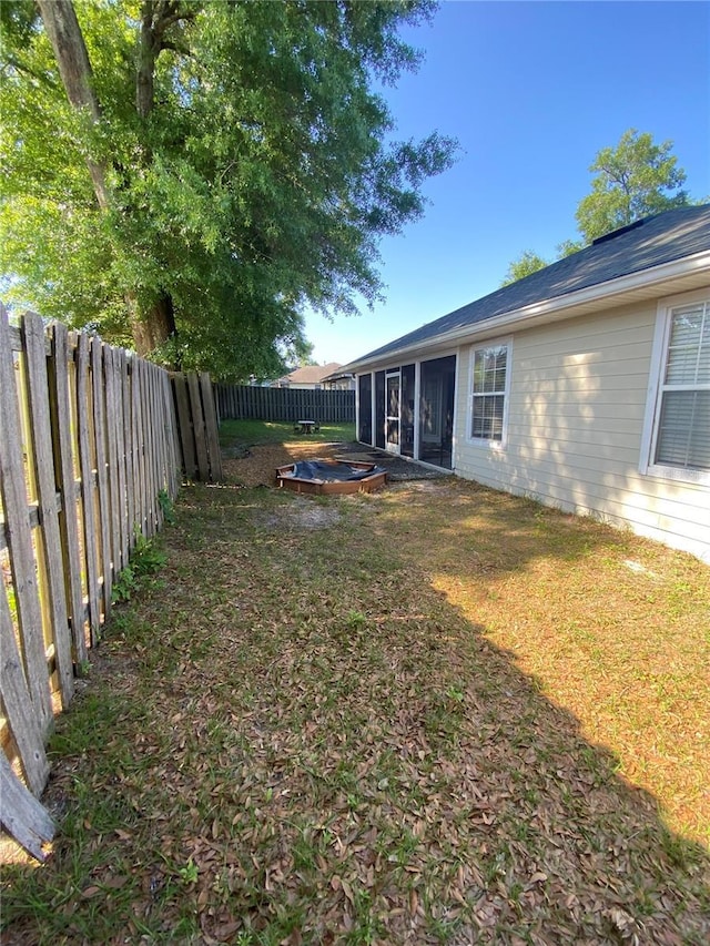 view of yard with a fenced backyard