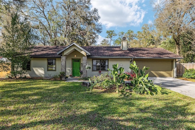 view of front of house featuring fence, concrete driveway, a front yard, an attached garage, and a chimney