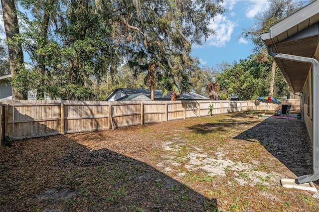 view of yard featuring a fenced backyard