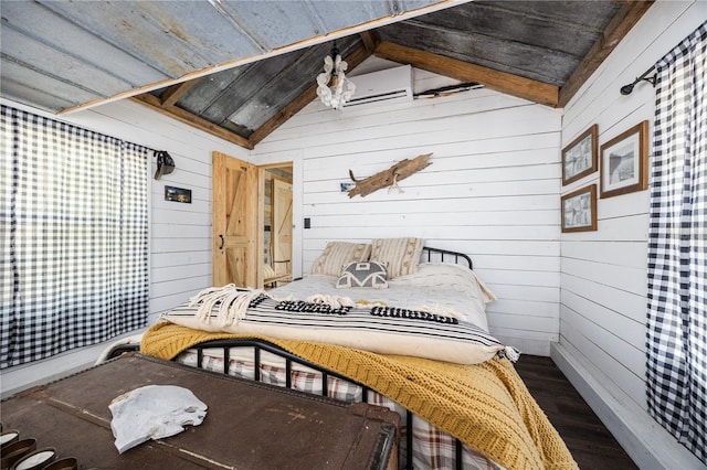 bedroom featuring wood walls, dark wood-style floors, vaulted ceiling, and a wall mounted AC