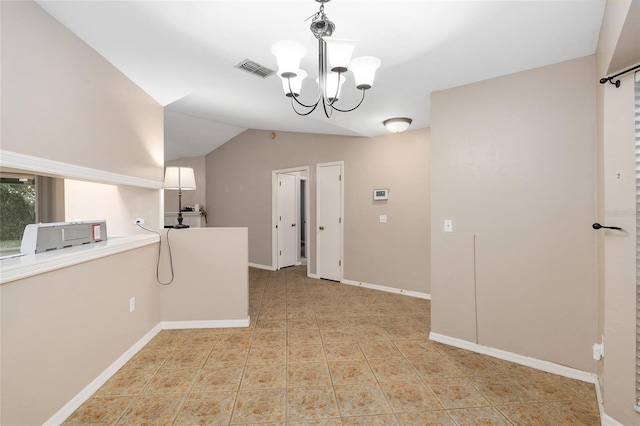 interior space with visible vents, baseboards, vaulted ceiling, light tile patterned flooring, and a notable chandelier