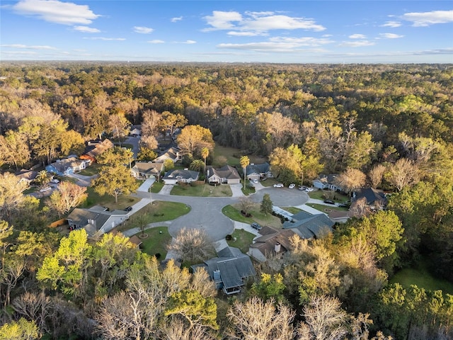 bird's eye view with a view of trees and a residential view