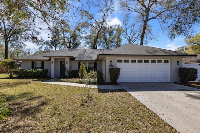 ranch-style house with concrete driveway, roof with shingles, an attached garage, a front lawn, and stucco siding