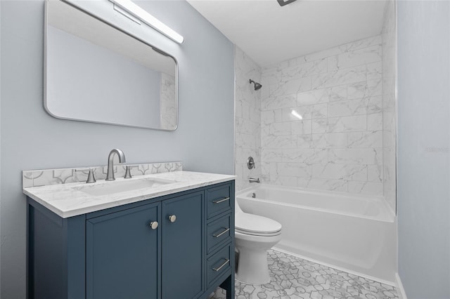 bathroom featuring toilet, shower / bathtub combination, and vanity