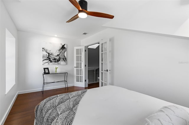 bedroom featuring french doors, visible vents, ceiling fan, wood finished floors, and baseboards