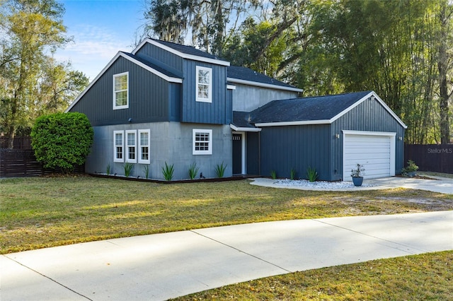 modern inspired farmhouse featuring driveway, roof with shingles, an attached garage, fence, and a front lawn