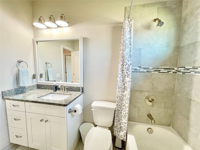 bathroom featuring shower / tub combo, vanity, and toilet