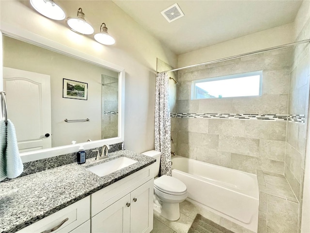 full bath featuring tile patterned flooring, toilet, vanity, visible vents, and shower / bath combo