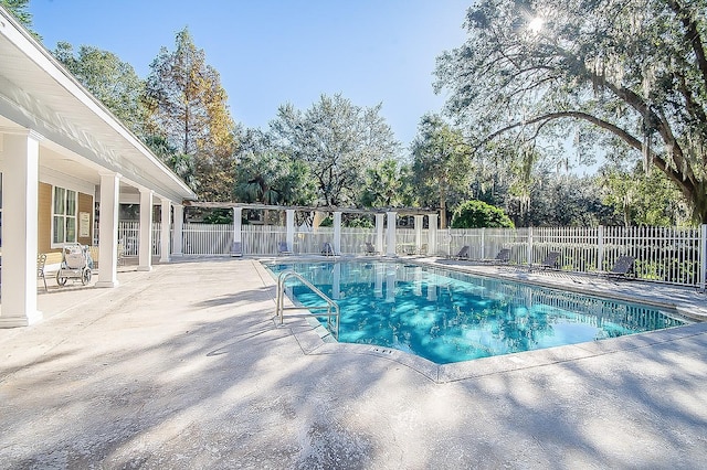 view of pool with a fenced backyard, a fenced in pool, and a patio