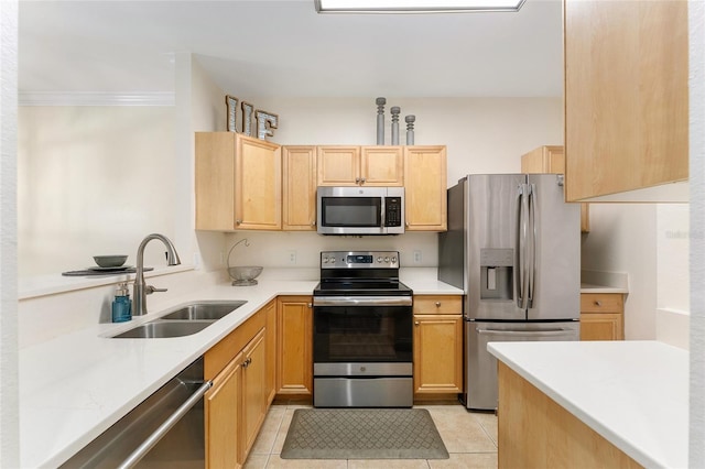 kitchen featuring light brown cabinets, a sink, stainless steel appliances, light tile patterned flooring, and crown molding