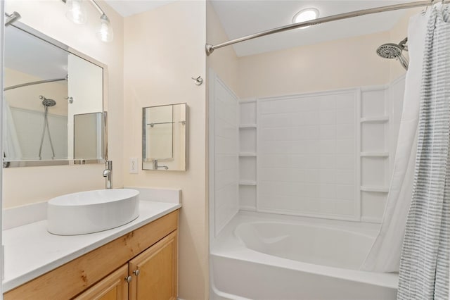 bathroom featuring vanity and shower / tub combo