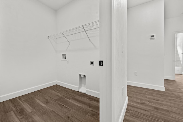 washroom featuring laundry area, baseboards, wood finished floors, hookup for a washing machine, and electric dryer hookup