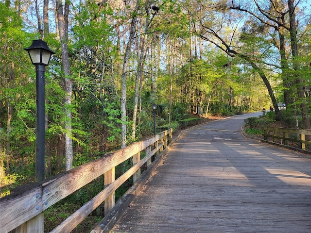 view of community with a forest view