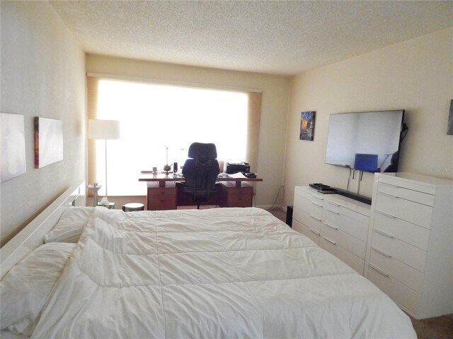 bedroom with a textured ceiling