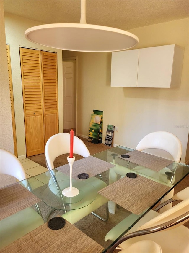 dining room featuring light tile patterned flooring