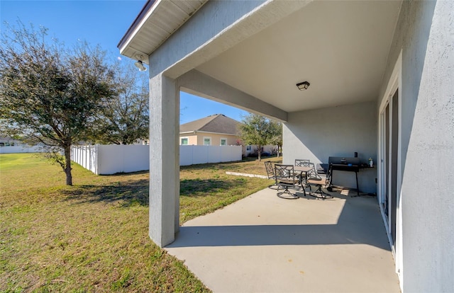 view of patio with fence