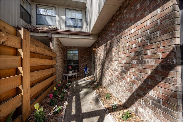 view of home's exterior with brick siding