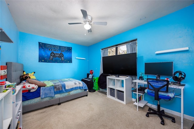 bedroom featuring carpet, baseboards, and ceiling fan