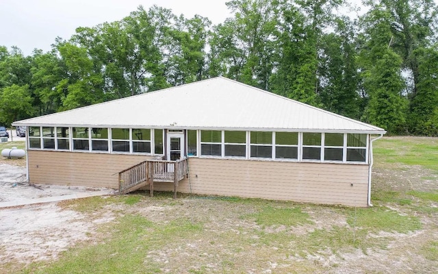 view of front of property featuring metal roof