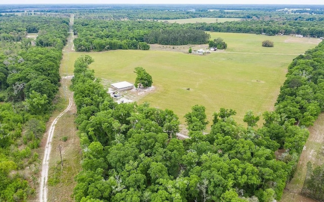 birds eye view of property featuring a rural view