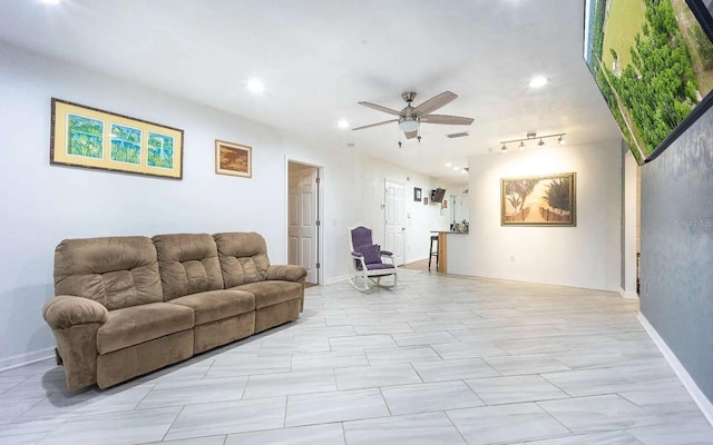 living area with recessed lighting, visible vents, baseboards, and ceiling fan