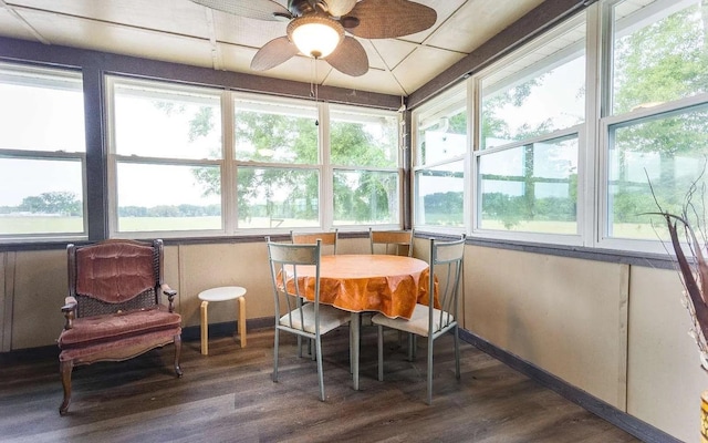 sunroom featuring a wealth of natural light and ceiling fan