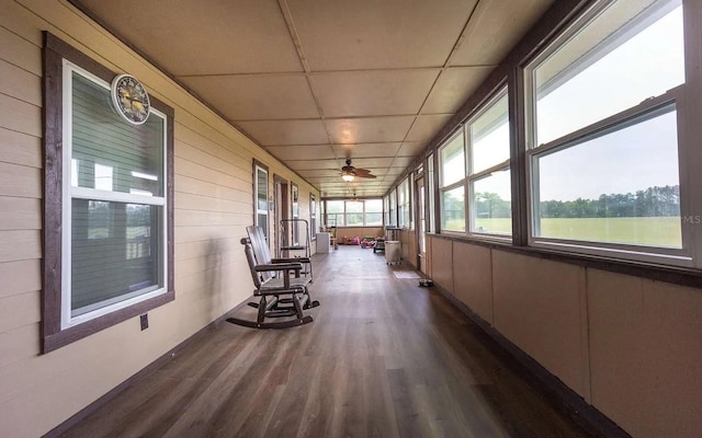 unfurnished sunroom with a paneled ceiling