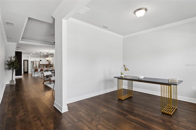 office area featuring ornamental molding, wood finished floors, and visible vents