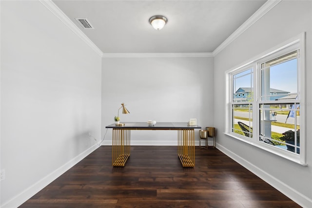 interior space with visible vents, crown molding, baseboards, and wood finished floors