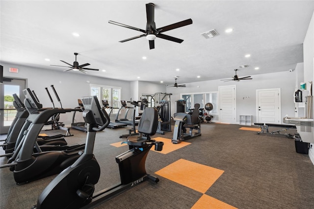 workout area featuring visible vents and recessed lighting