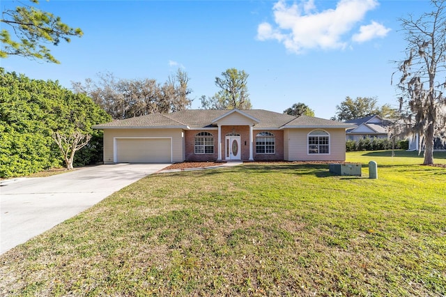 single story home featuring brick siding, driveway, a front yard, and a garage