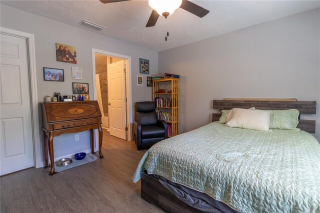 2306 NW 121st Ave, Gainesville, FL 32609 - bedroom with wood finished floors, ceiling fan, and visible vents