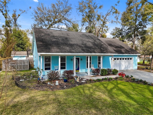 view of front of home featuring a garage, driveway, fence, a porch, and a front yard