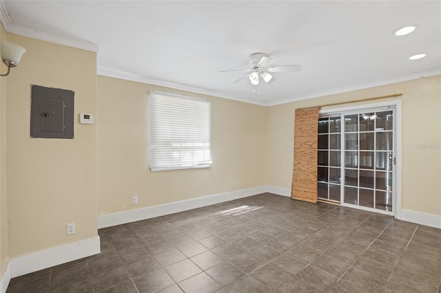 tiled spare room with ceiling fan, electric panel, baseboards, and crown molding