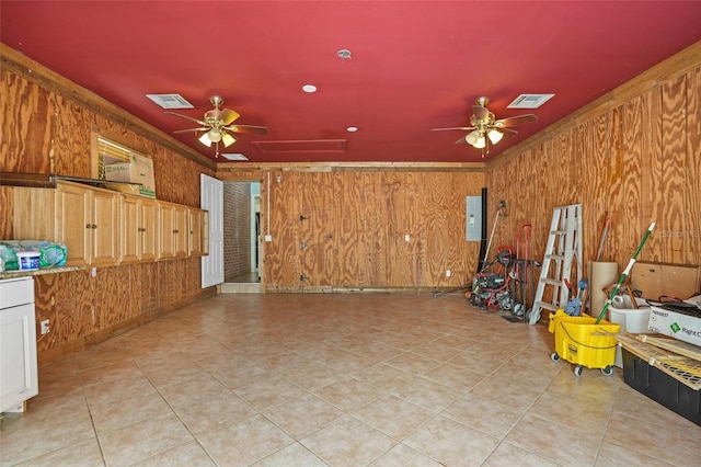 miscellaneous room featuring a ceiling fan, electric panel, and visible vents