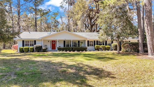 ranch-style home with a front yard