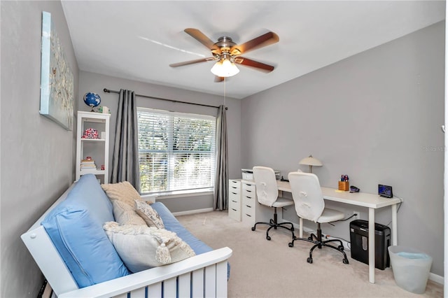 home office featuring baseboards, a ceiling fan, and carpet floors