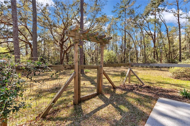 view of yard with a gate and fence