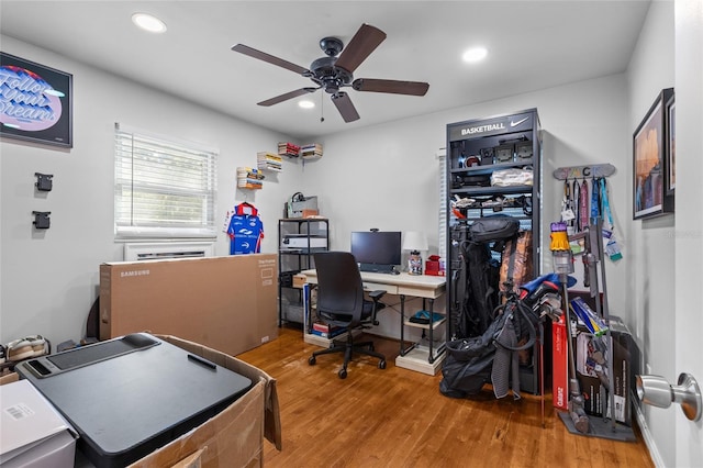 home office featuring a ceiling fan, recessed lighting, and wood finished floors