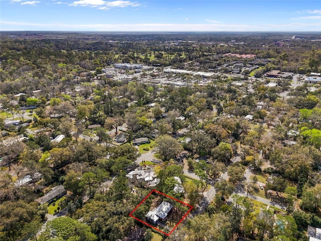 bird's eye view featuring a forest view